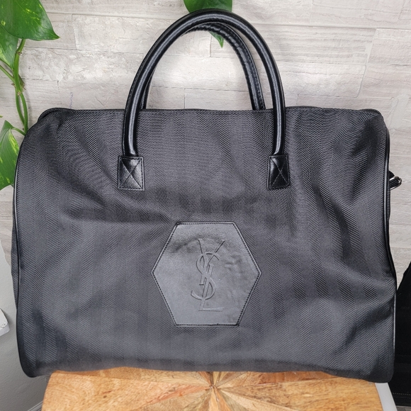 Yves Saint Laurent Parfums Black Duffle bag - Picture 1 of 11